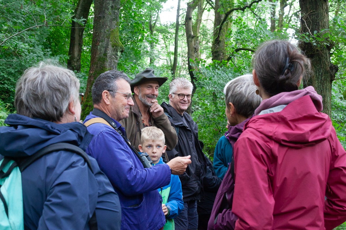 Mark Cocker and other naturalists in Nutclough Wood